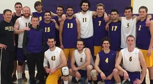 A group of men in purple and yellow jerseys.